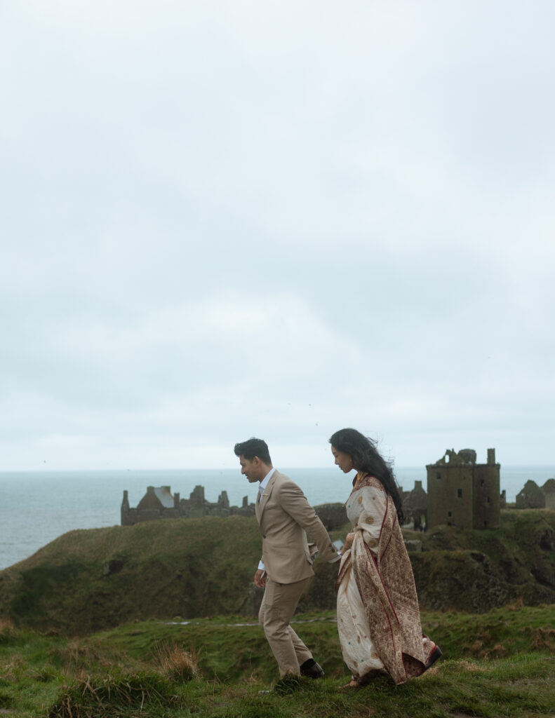 elope in scotland along the cliffs of dunnottar beach