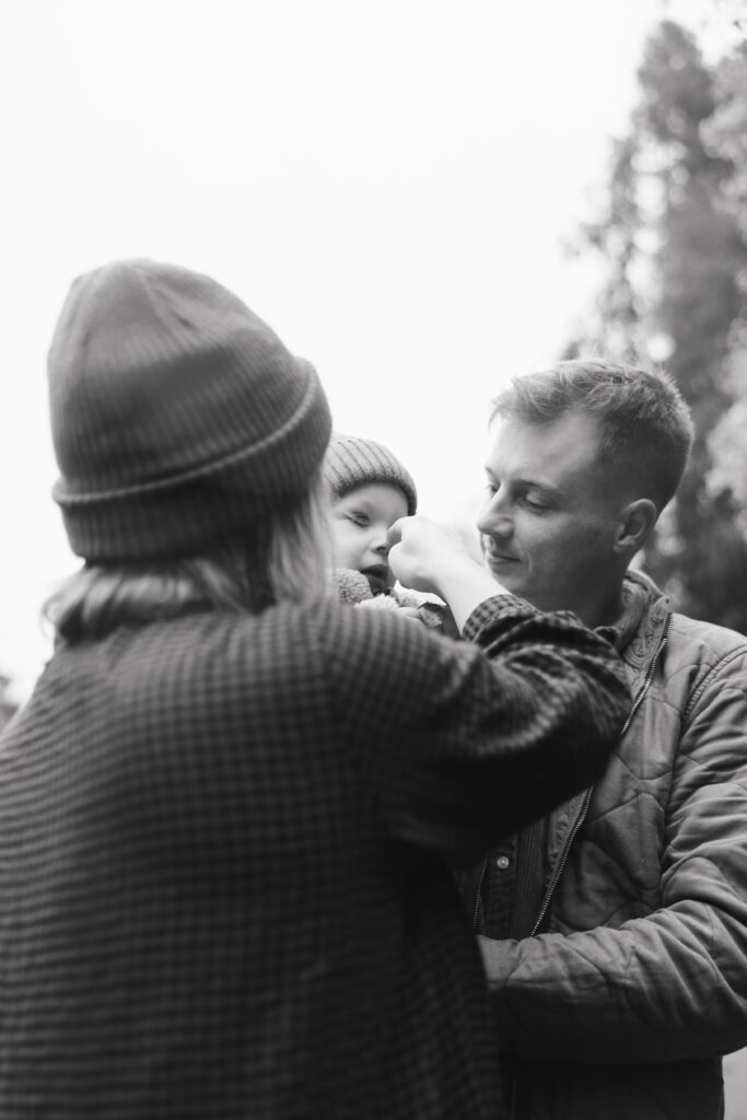 Cuddling during a family photoshoot in the Scottish Highlands