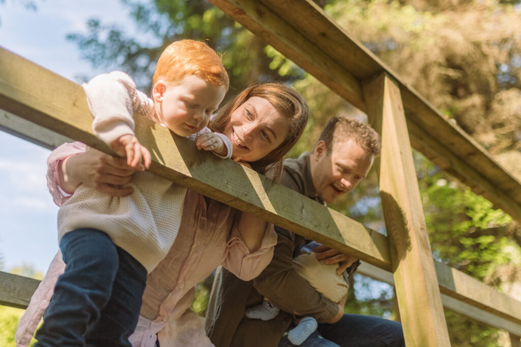 Aberdeenshire family photographer capturing children on a wooden bridge