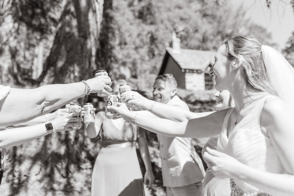 small elopement day party cheers under caledonian scots pine trees