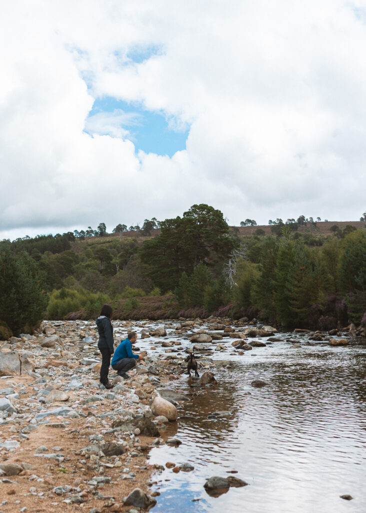 Relaxed Cairngorms couples photoshoot featuring adventurous hikers in the Scottish Highlands